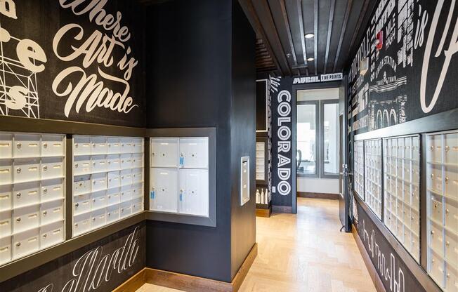a retail store with black walls and glass cases of shoes