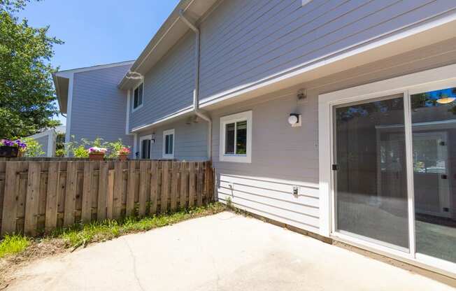 Enclosed Patio in the Three Bedroom Townhome at Woodbridge Apartments Bloomington