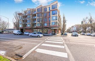 Spacious + secure 1/1 condo with a bonus room/office + parking & storage available soon!