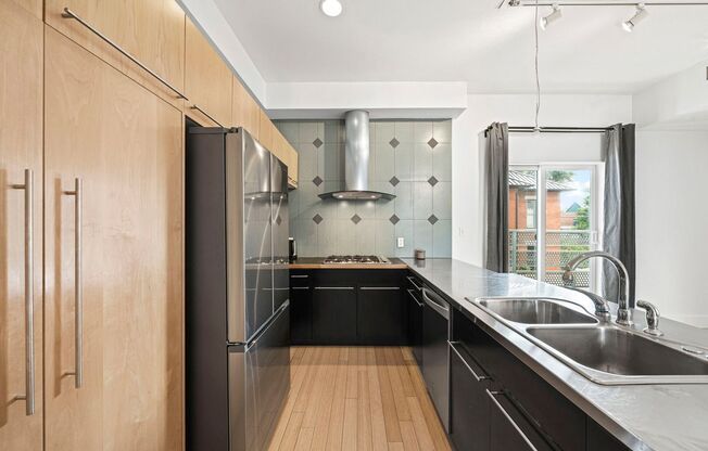 Modern 3BD, 3.5BA Five Points Townhome with 2 Balconies and 2 Parking Spots