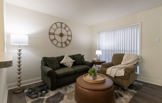 This is a photo of the living room in the 472 square foot 1 bedroom, 1 bath apartment at Princeton Court Apartments in the Vickery Meadow neighborhood of Dallas, Texas.