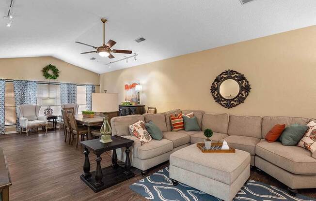 a living room with a couch and a table