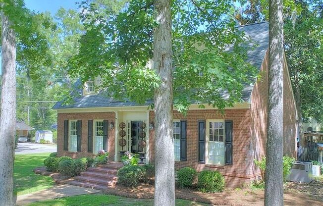 Beautiful Home in Dougherty County!!! Gorgeous all brick, colonial style home in the desirable Lake Park neighborhood! All brick home has 4 bd, 2.5 ba with real hard wood floors, new carpet on second story, chandeliers in entry and dining area, ceiling fa