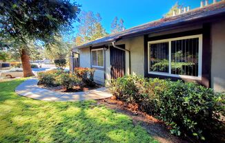 Spacious 2bd First Floor Condo W/Private Patio, Attached Garage, & Private Laundry Room