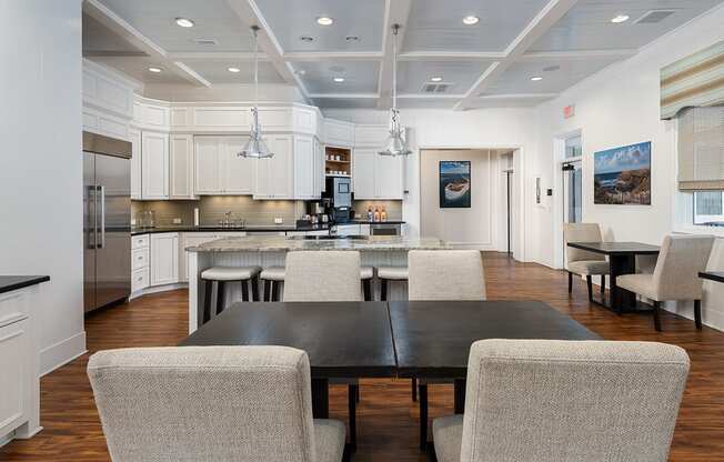 Resident lounge with dining areas at The Reserve at Mayfaire Apartments, Wilmington NC