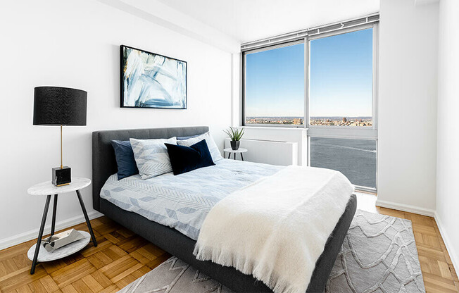 Luxury one bedroom apartment with Hudson River views in Hudson Yards with wood floors and air condit