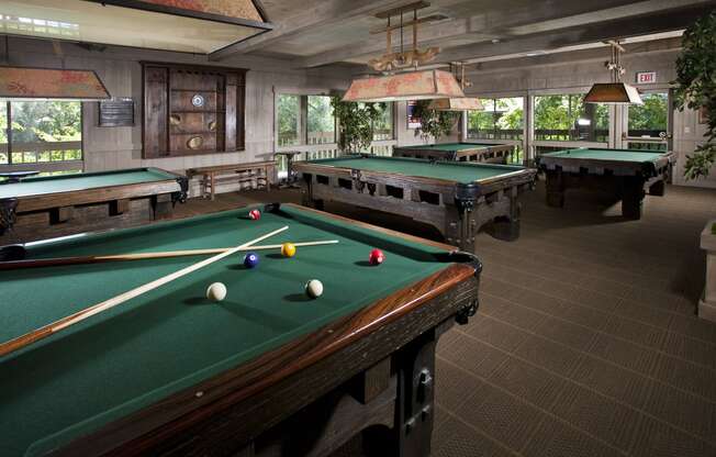 two pool tables in a clubhouse game room