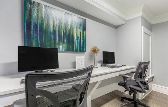 a bedroom with a bed and desk in a room