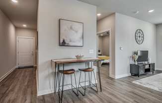 Spacious Living Area With Wood-Style Flooring