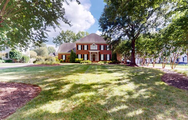 Exquisite full brick, beautifully maintained home in Providence Country Club