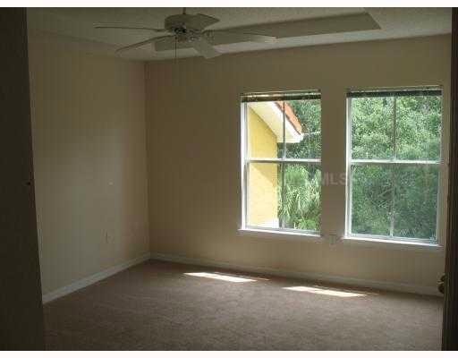 Well maintained condo, water included, in a GATED COMMUNITY with community POOL at heart of new Tampa