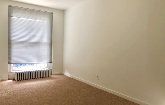 For Rent: Classic Elegance at 2504 N Calvert St – Your Timeless Urban Retreat!