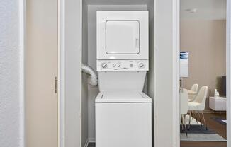 a refrigerator freezer sitting in a room