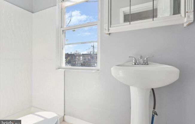 Welcome to this updated 2-bedroom, 1-bathroom row home in the historic Strawberry Mansion neighborhood.