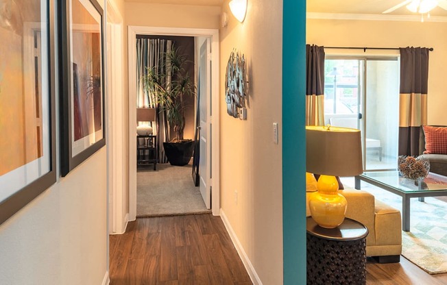 a living room with a blue accent wall