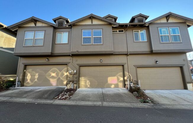 Cozy 3 Bed 2.5 Bath Townhouse in Bethany neighborhood! Attached garage and in unit washer/dryer!