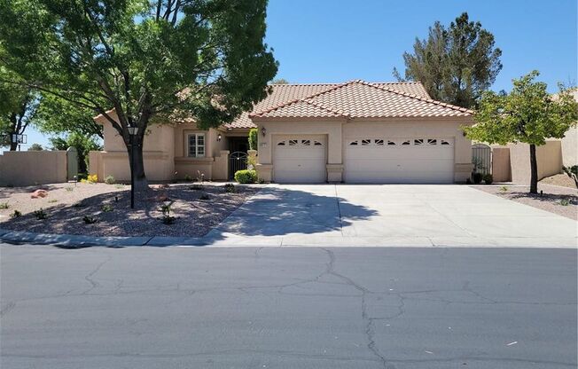 EXQUISITE SEM-CUSTOM HOME ON 1/2 ACRE IN GATED NW COMMUNITY