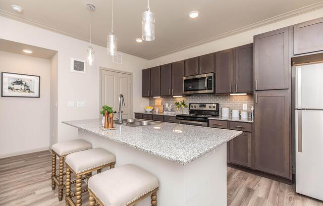 a modern kitchen with stainless steel appliances