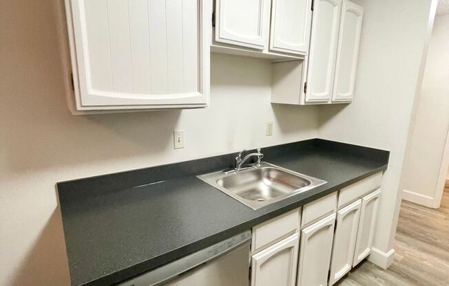 Nicely Renovated 2 Bedroom, 1 Bath Duplex with Washer/Dryer Hookups + Off Street Parking