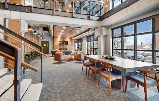 a large open room with a large table and chairs at The Yards and Backyards, Minnesota