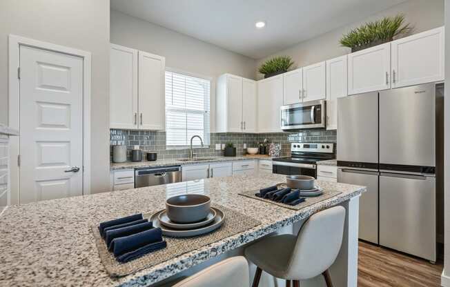Gourmet Kitchen with Island at Avilla Cypress Creek, Sun City Center, FL 33573