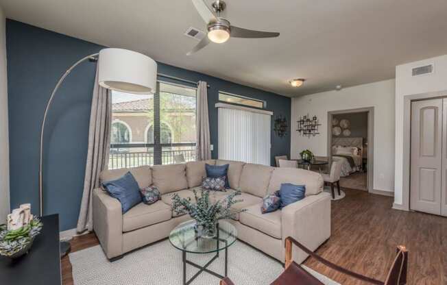 a living room with a couch and a table