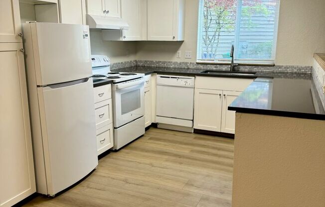 Renovated 2 Bed, 1.5 Bath Townhouse with Garage