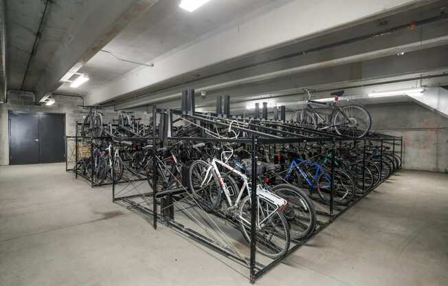 a rack full of bikes in a parking garage