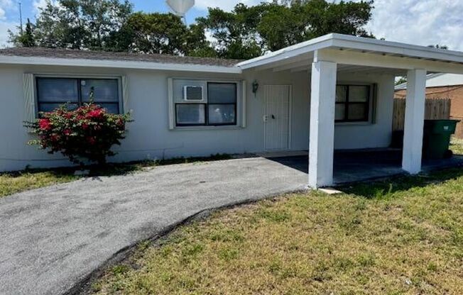 Single Family Home in Mangonia Park w/ Large fenced in yard