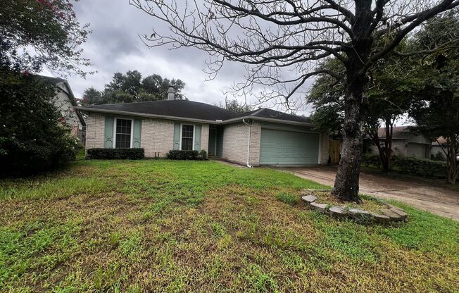 4 Bedroom 2 Bathroom Cypress Home with Fireplace and Fenced Backyard