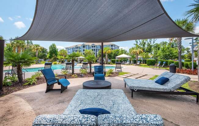Windward Long Point Apartments - Poolside covered lounge area