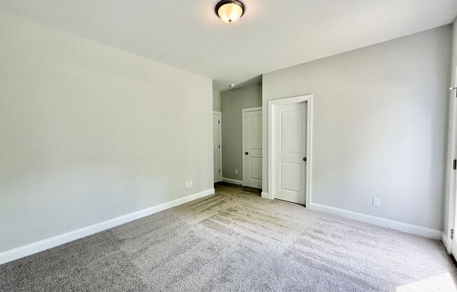 Stunning New Construction 3BD, 3.5BA Fuquay-Varina Townhome Near Shopping and Dining