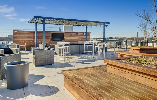Host family and friends on the rooftop deck with a social lounge and spectacular views