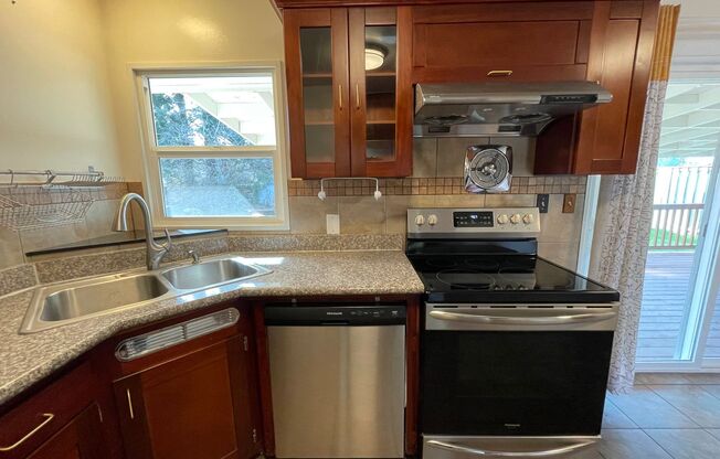 SE Home with Large Backyard, Bonus Room with Loft and Washer & Dryer Included!
