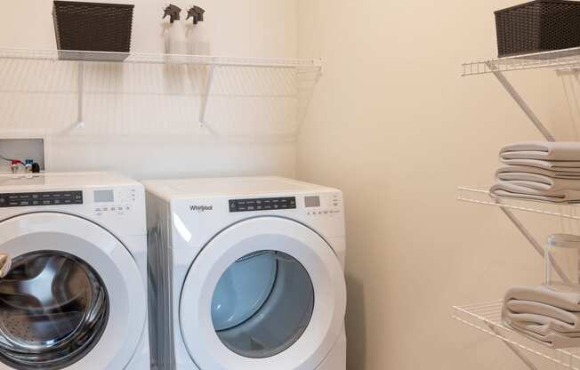 a washer and a dryer in a laundry room