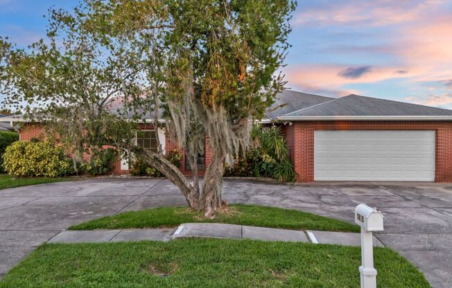 Canal-Front Oasis: Spacious 3-Bedroom Home with Screened Porch & Waterfront View!