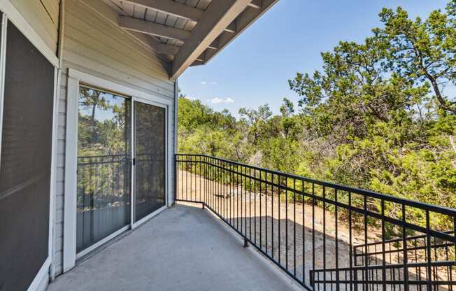 private balcony overlooking the woods