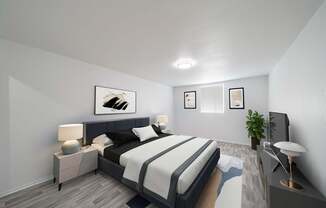 A bedroom with a large bed and a painting above it.