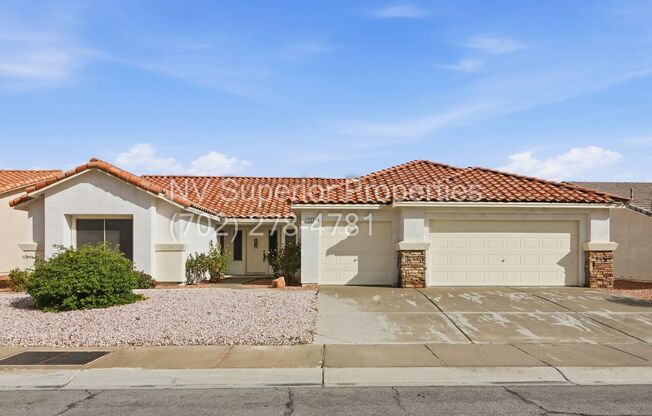 NW!! Single Story!!! 3 Car Garage!!  2 Masters!!! Low Maintenance desert landscape front yard!!  Covered Patio in back yard!! No Carpet!!!!