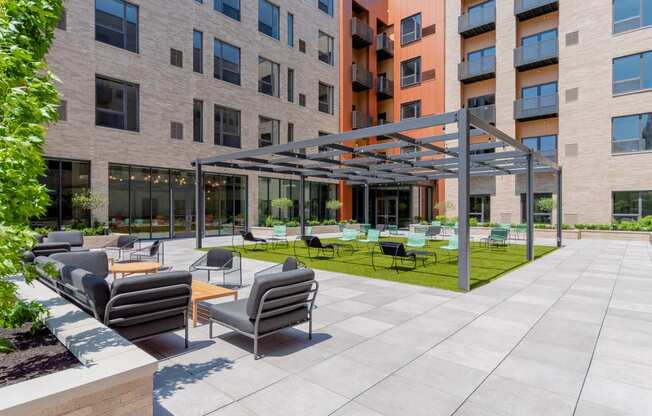 an outdoor lounge area at TREO Apartments, Cleveland