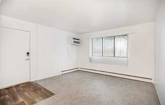 living room with a large window