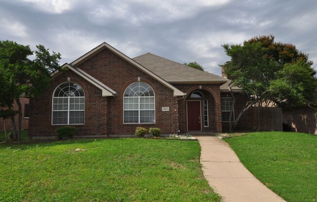 Welcome to this charming 3-2-2 brick home in the heart of Plano!