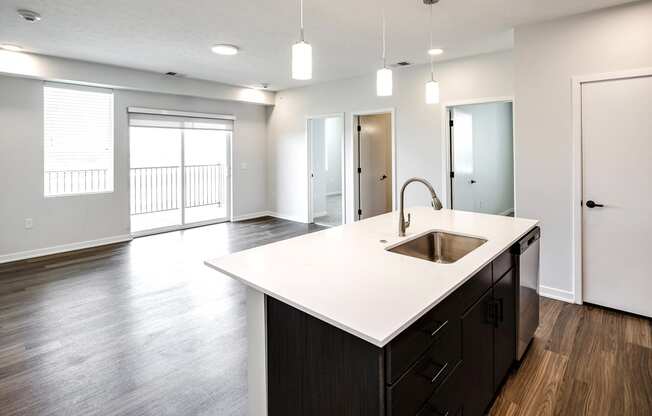 Studio, one two and three bedroom apartments and townhomes featuring open concept floor plans, dens, large windows, stainless steel appliances, quartz countertops, eat-in kitchens, pantries, LVT flooring and much more at The Trails at North Streams in Omaha, NE