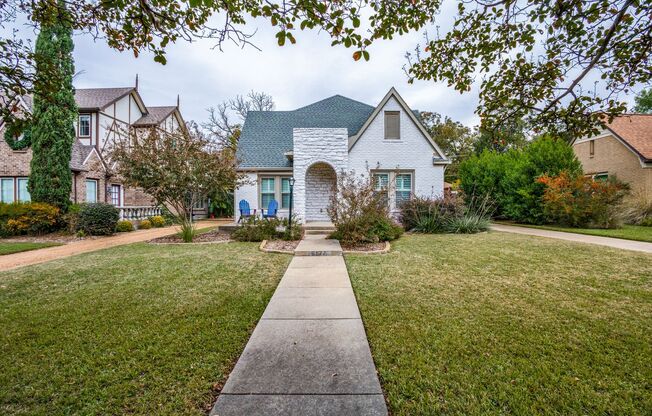 BEAUTIFULLY UPDATED TUDOR on a quiet tree-lined Lakewood street!