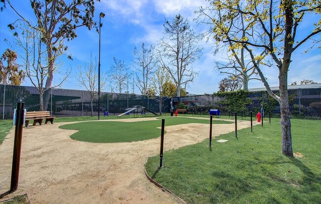 a park with a baseball field and a playground