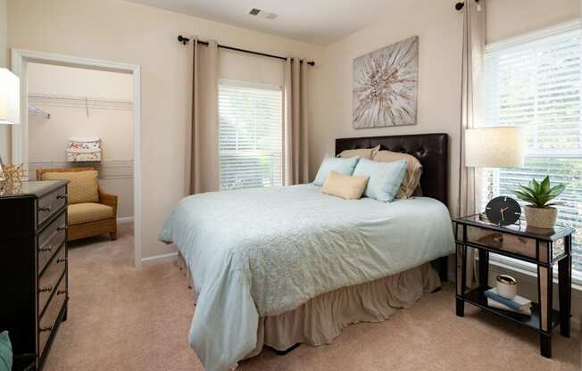 Spacious Bedroom With Comfortable Bed at Abberly Place at White Oak Crossing Apartments, HHHunt Corporation, Garner, NC, 27529