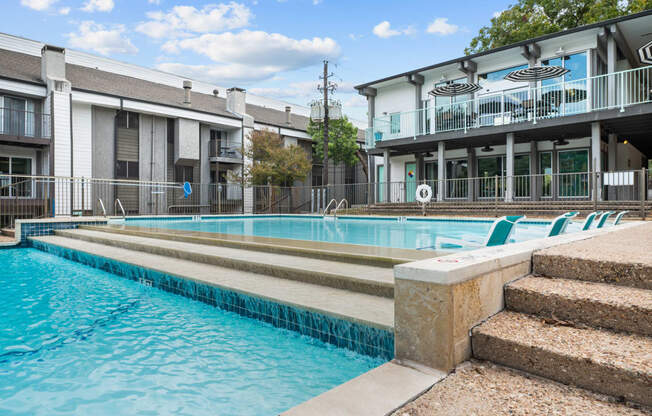 the swimming pool at the falls at borough park apartments