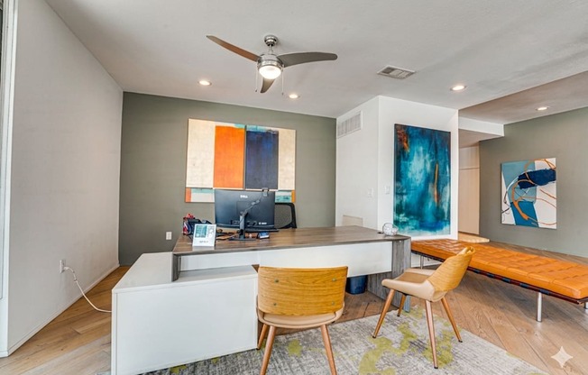 Modern home office with dual monitor workspace at Vue Live Oak Apartments, Dallas, 75204