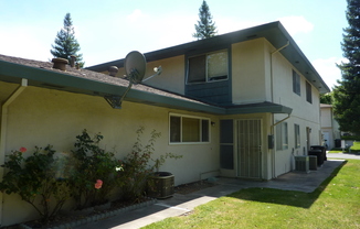 Two Story Fourplex Unit - On site Laundry, Carport, Ceiling Fans