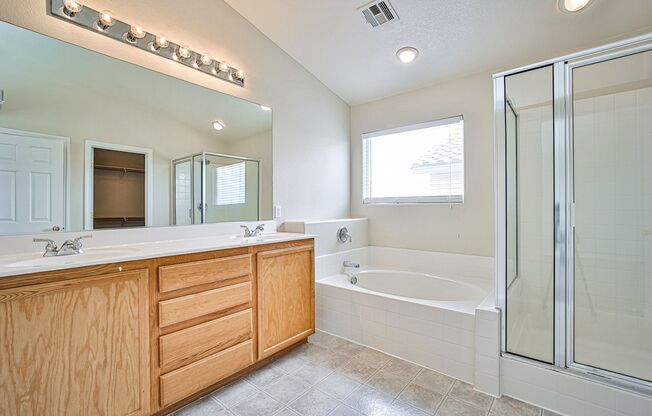 BEAUTIFUL TWO STORY HOME LOCATED IN GATED COMMUNITY FOR RENT